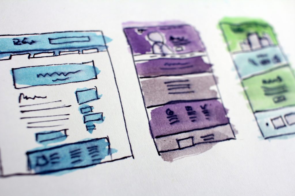 A blue, purple, and green web design sketch for a website | Photo Credit: Hal Gatewood